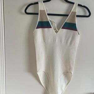 Cream, gold, emerald and maroon bodysuit